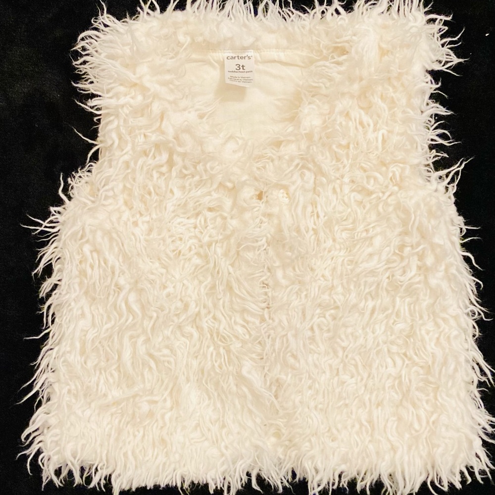 White faux fur vest